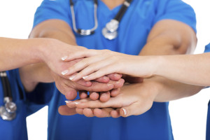 group of medical doctors hands together